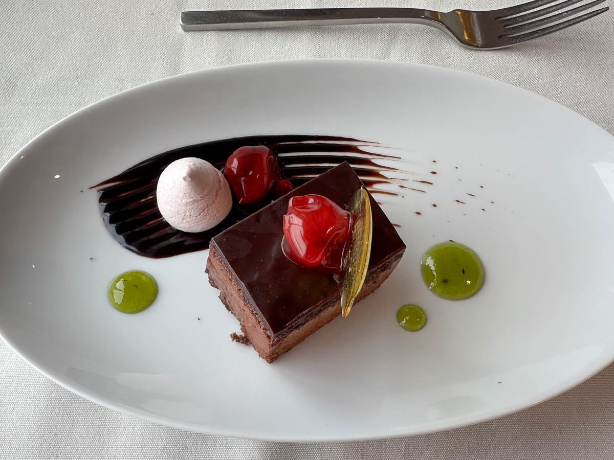 Plated chocolate cake on the Aurora Expeditions Greg Mortimer ship