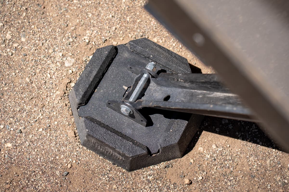 RV jack pad attached to a stabilizer on a Safari Condo Alto A1752 trailer