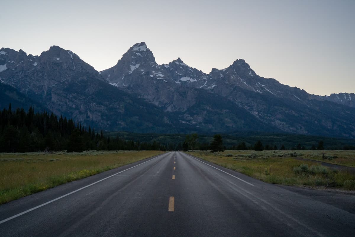 Road leading to the Teton Mountains in Grand Teton National Park in Wyoming
