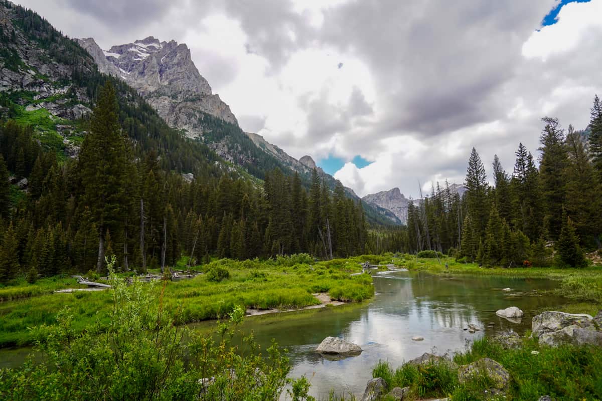 Cascade Creek lined with Teton Mountains along the Cascade Canyon Trail in Grand Teton National Park in Wyoming