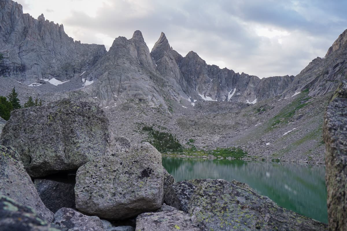 The backside of the Cirque of the Towers over Shadow Lake along hte cirque of the Towers trail in the Wind River mountain range of Wyoming