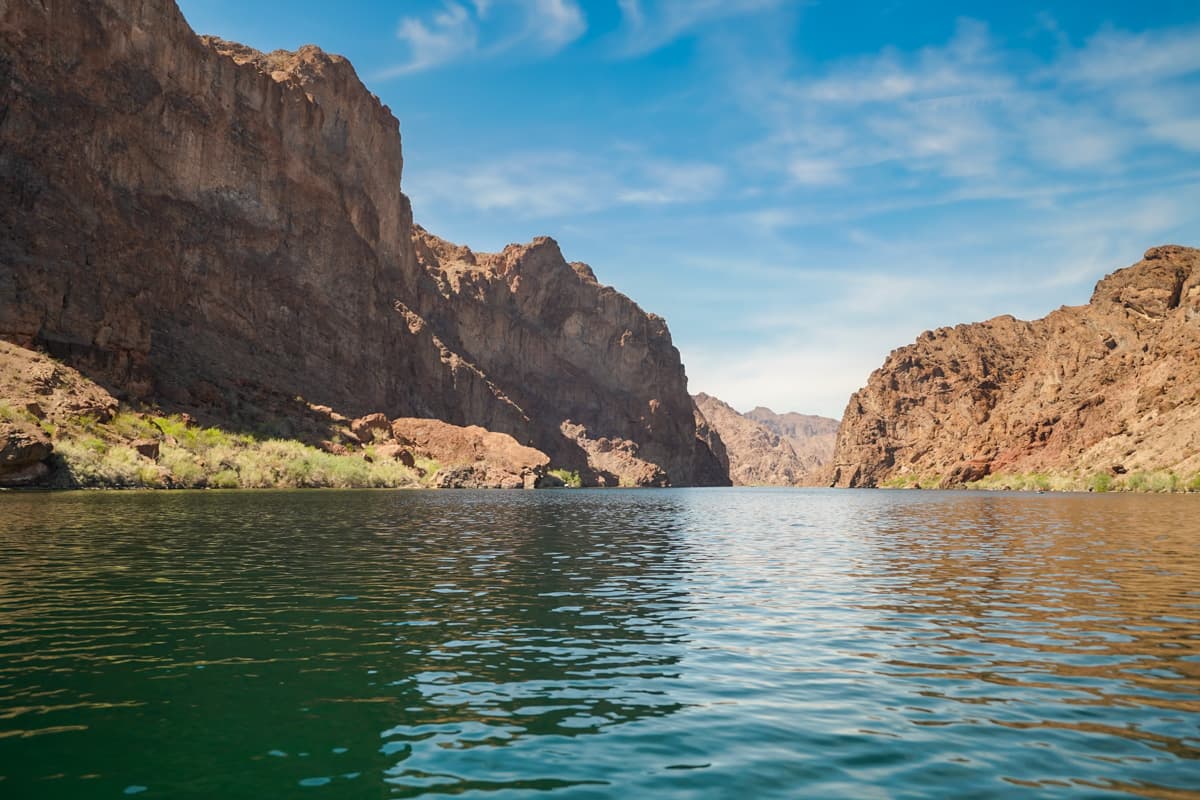 Red canyon walls along the Colorado River in Lake Mead National Recreation Area in Willow, Arizona