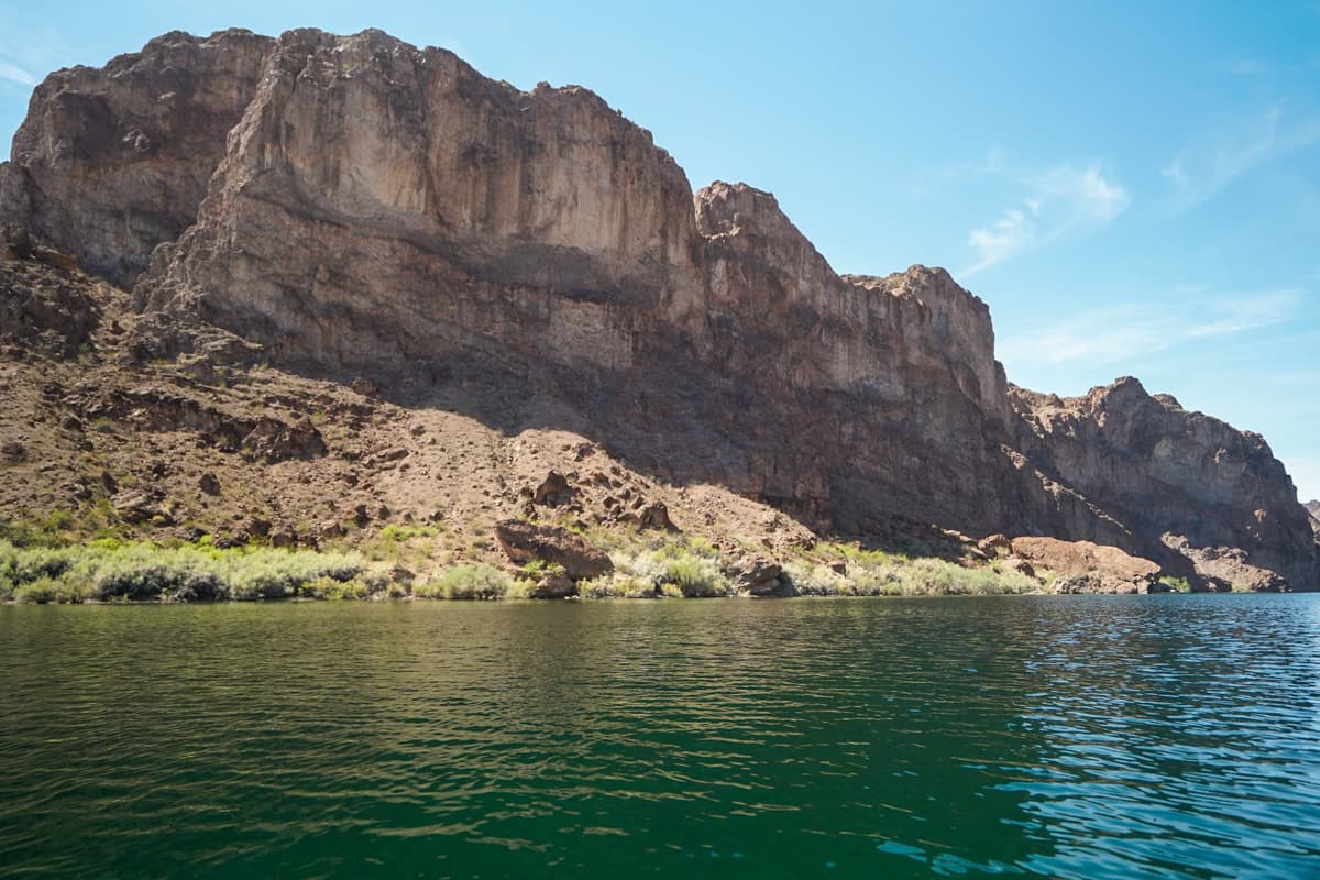 Red canyon wall along the Colorado River in Lake Mead National Recreation Area in Willow, Arizona