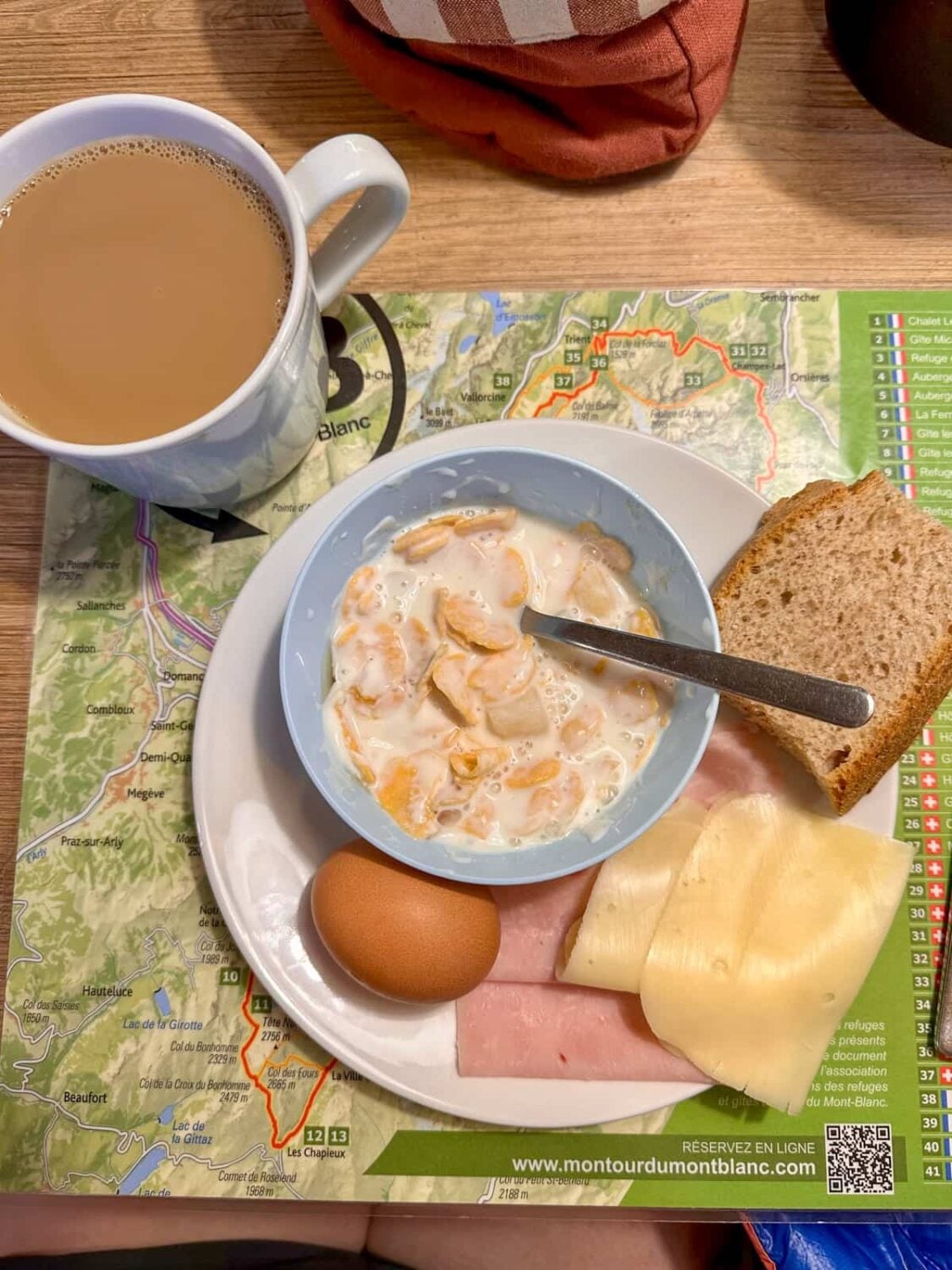 Aerial view of breakfast at Rifugio Monte Bianco near Courmayeur, Italy along the Tour du Mont Blanc