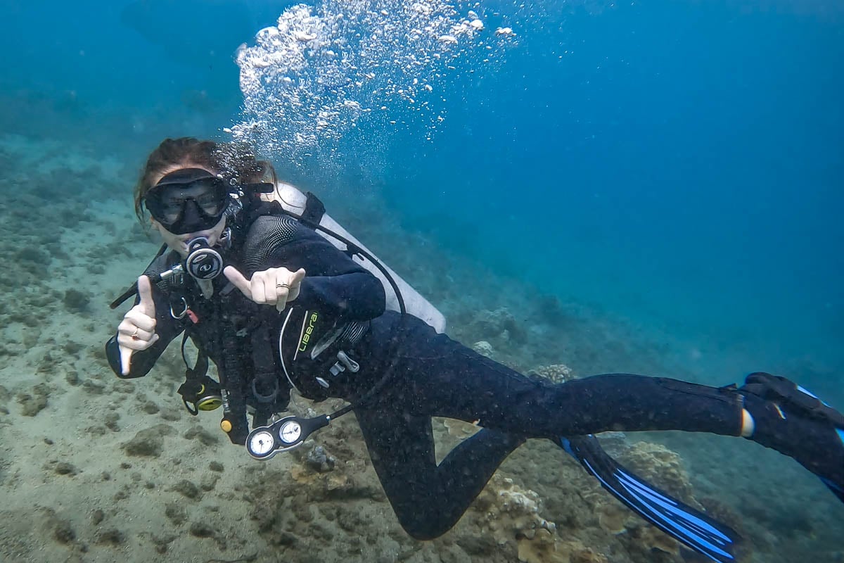 Woman scuba diving in Kauai