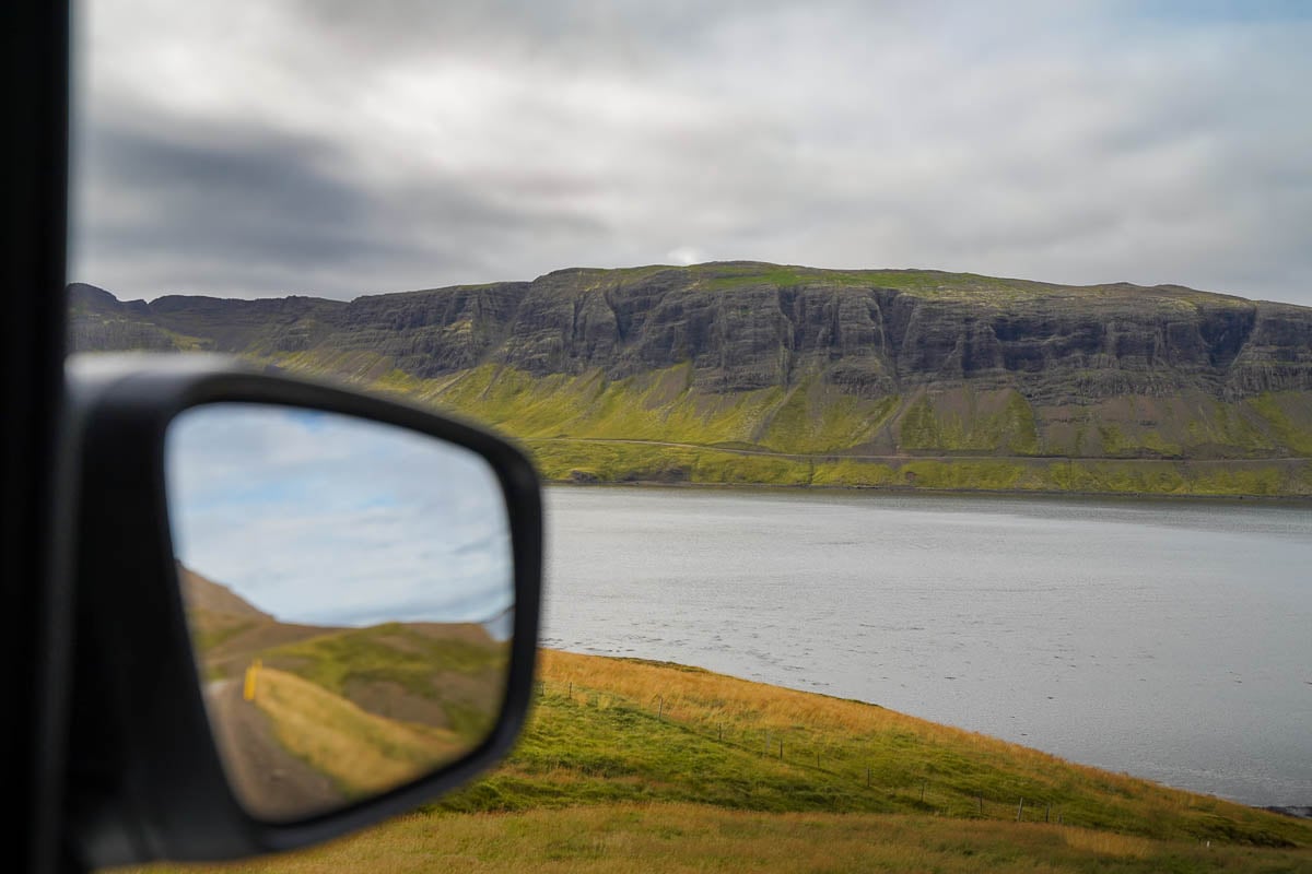 View of green rugged mountains near a fjord in the Snaefellsnes Peninsula in Iceland