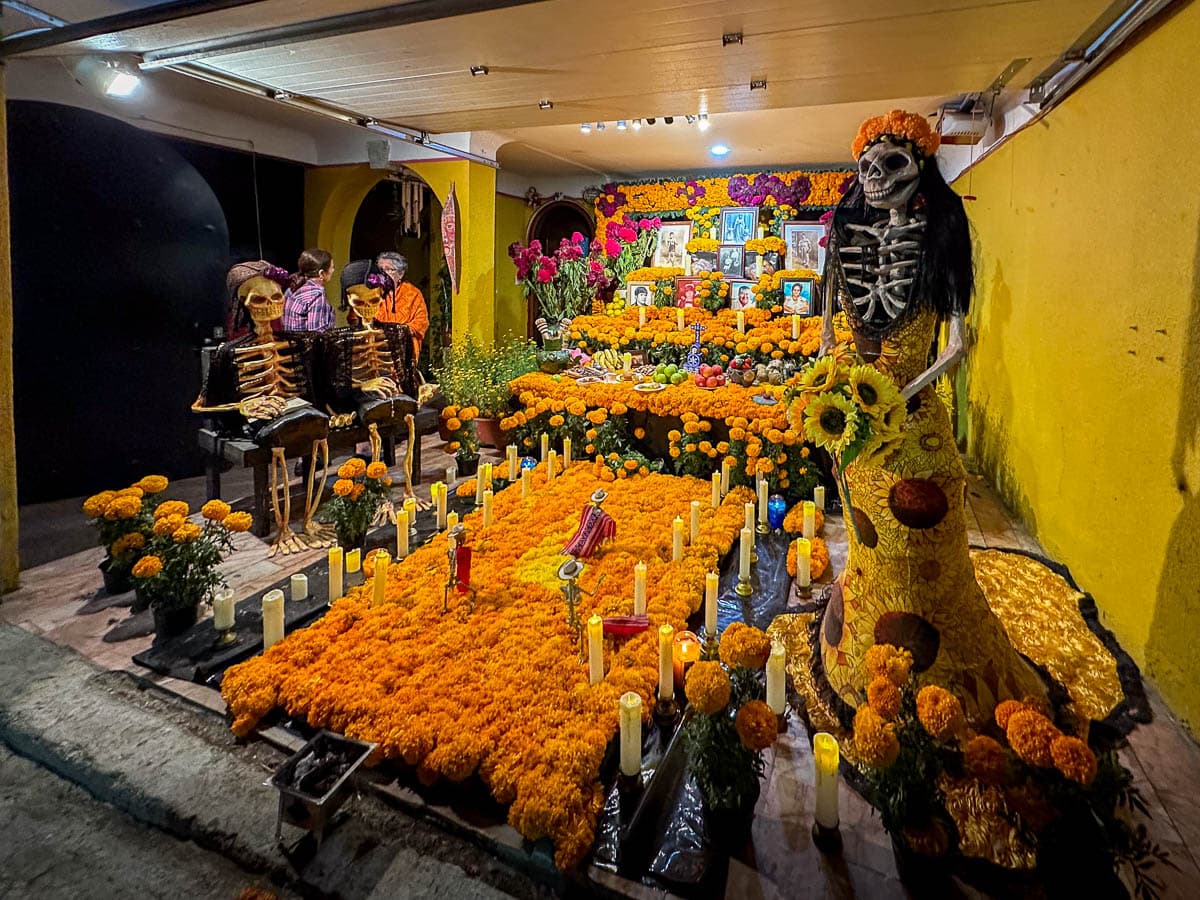 Intricate ofrenda with marigolds and skulls during Day of the Dead in Oaxaca, Mexico