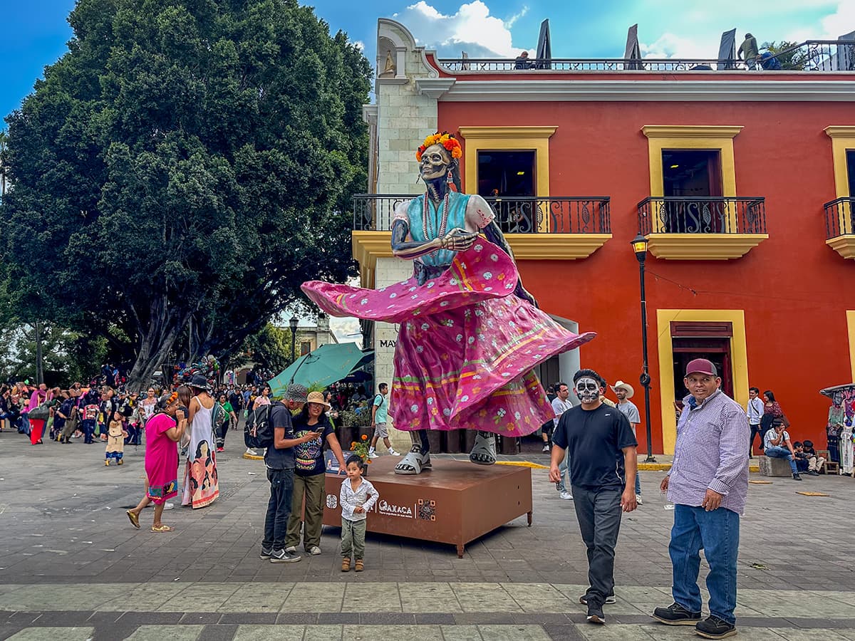 Statue of a skeleton wearing a traditional Mexican clothing in Centro Histórico during Day of the Dead in Oaxaca, Mexico