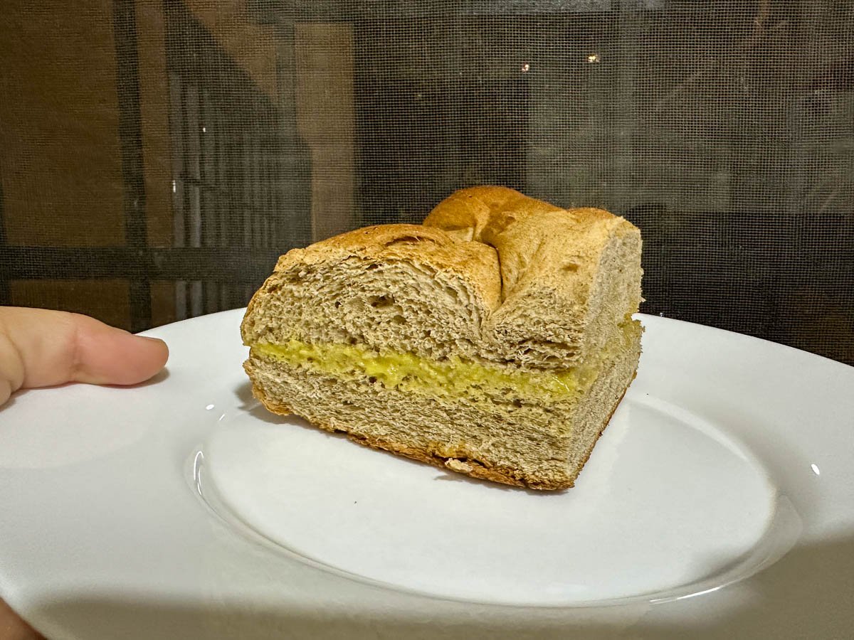 Pan de muertos on a plate during Dia de Muertos in Oaxaca, Mexico