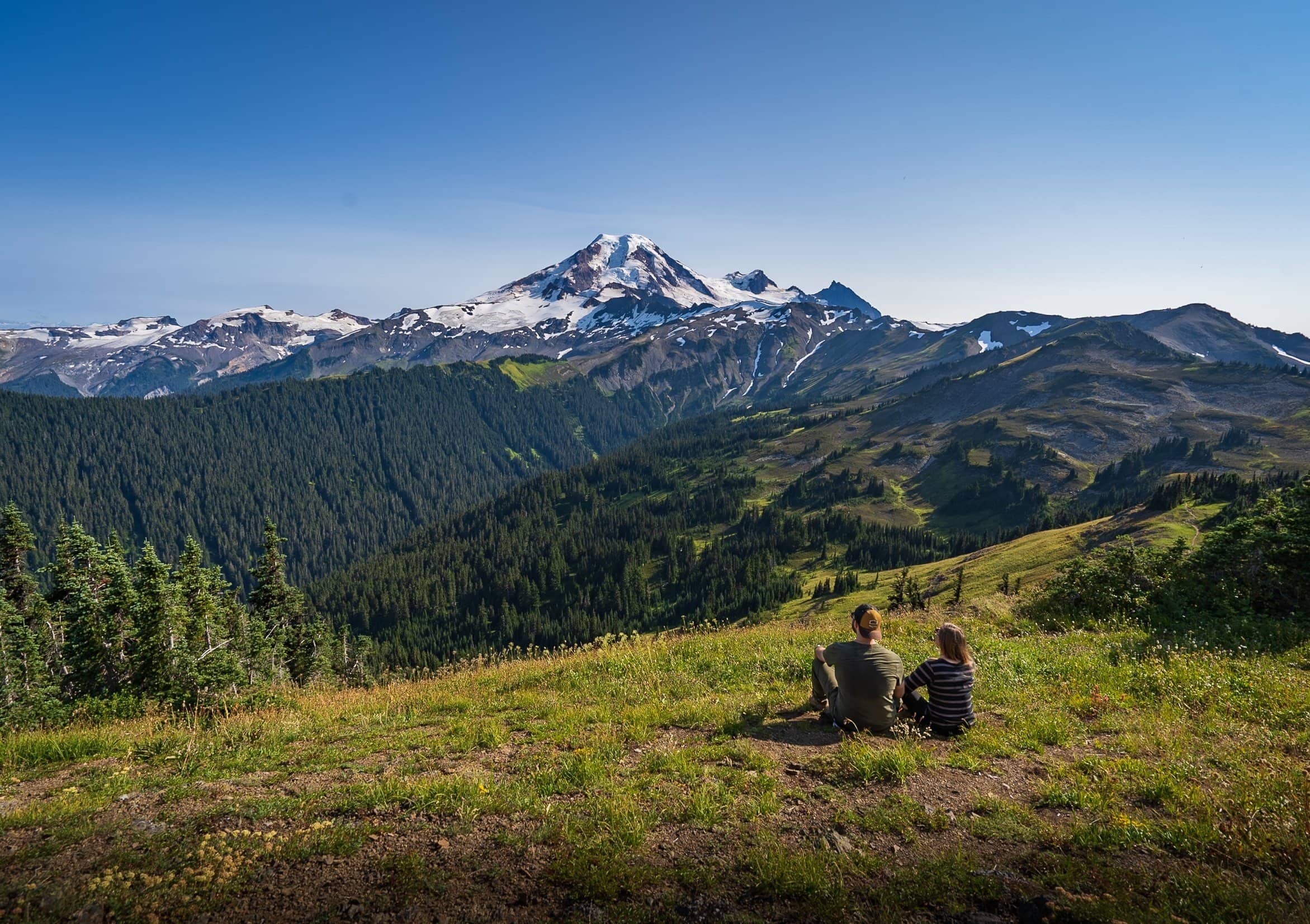 couple looking at Mount Baker at Skyline Divide