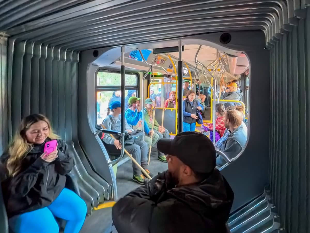 People sitting on the Zion shuttle in Zion National Park