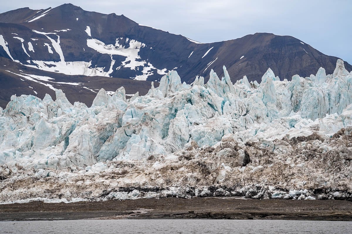 Nordenskiöld Glacier in front of mountains in Svalbard, Norway