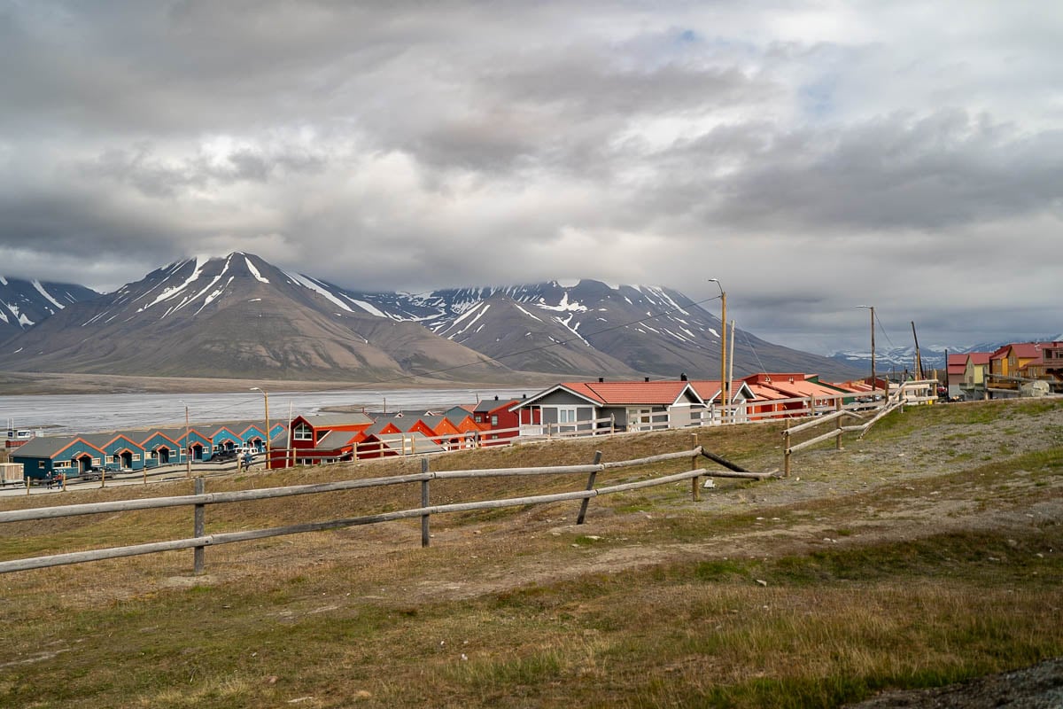 Buildings in front of a fjord with mountains in Longyearbyen, Svalbard