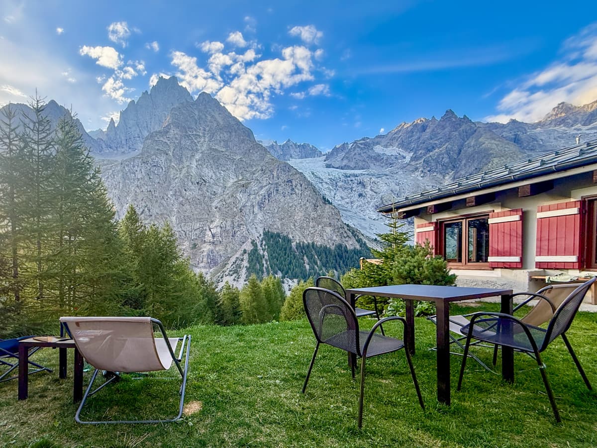 Patio with the Italian Alps and glaciers in the background at Rifugio Monte Bianco along the Tour du Mont Blanc
